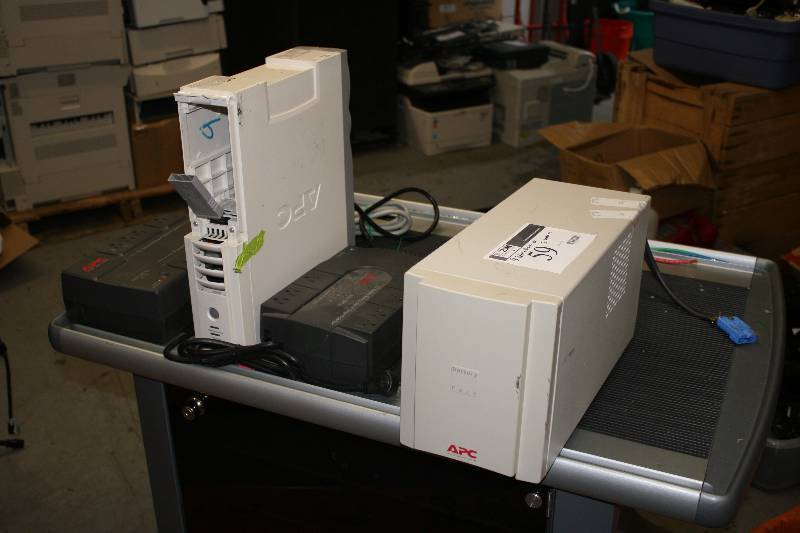 lot 59 image: Lot of (4) Battery Back-Ups Including APC ES 550 APC SU48XLBP BE35OU And More.