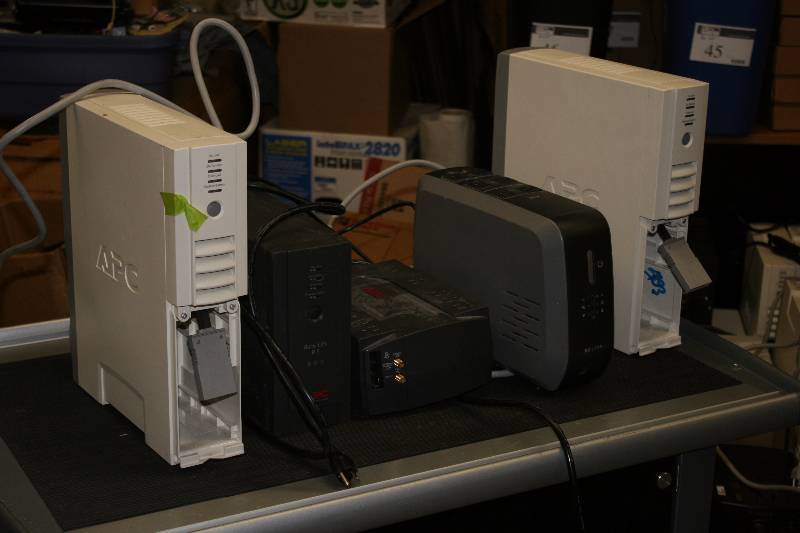 lot 63 image: Lot of (5) Battery Back-Ups Including APC 725 APC 800 And More 3 out of 5 Powers On.