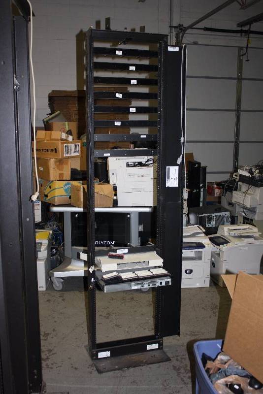 lot 12 image: Server Rack 26.5 x 16 x 84 Black Includes Miscellaneous Contents.