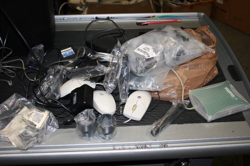 lot 45 image: Box Lot Including Computer Mouses Miscellaneous Cords Imation Device And More.