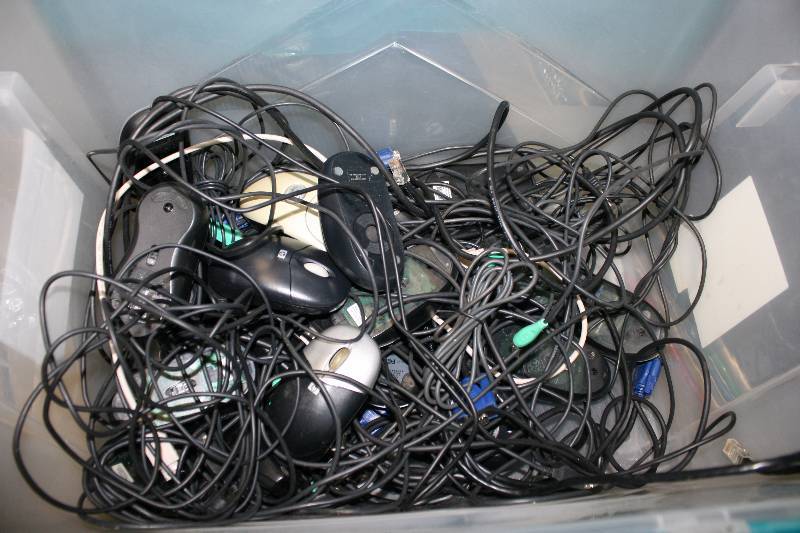 lot 55 image: Box Lot of Miscellaneous Electronics Cords, Computer Mouses & Hardware.