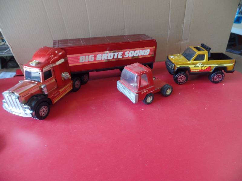 3 Buddy L Trucks