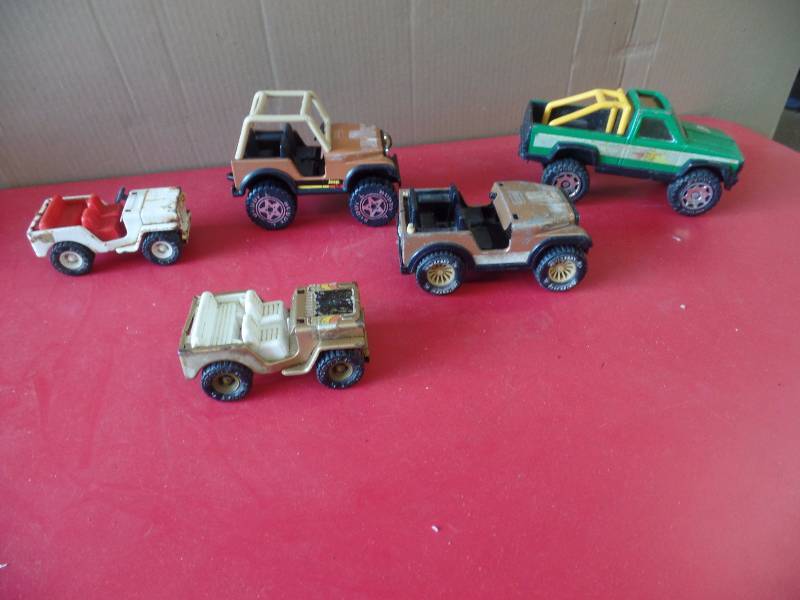 5 Buddy L Trucks