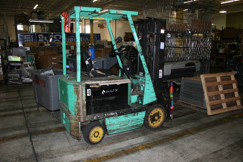 lot 3 image: Mitsubishi Electric ForkliftLift Truck Model FBC20 7540.3 Hours Serial #AFB2-002-07 Green Heavy-Duty Tires Black Seat Includes Battery Charger.