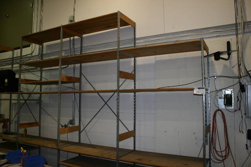 lot 26 image: Reinforced Wood Shelving Lot Including Uprights 24 x 120 (4) Upright 24 x 96 Shelves 24 x 47.5 (20) Uprights 12 x 120 (2) Shelves 12 x 47.5 (8) Contents Not Included.
