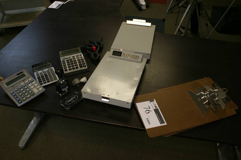 lot 76 image: Table Lot Including Clip Boards (6) Calculators (3) Clamps (3) And More.