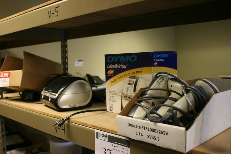 lot 126 image: Shelf Lot Including Dymbo LabelWriter 450 Twin Turbo Dymbo LabelWriter 400 Uline Shipping Labels And More.