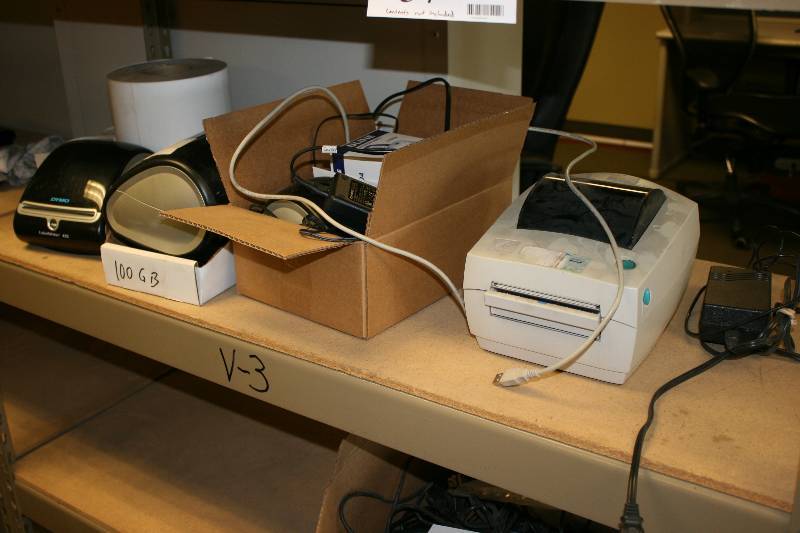 lot 127 image: Shelf Lot Including Dymbo LabelWriter Model 1750160 Dymbo LabelWriter Model 1730542 Uline Shipping Labels And More.