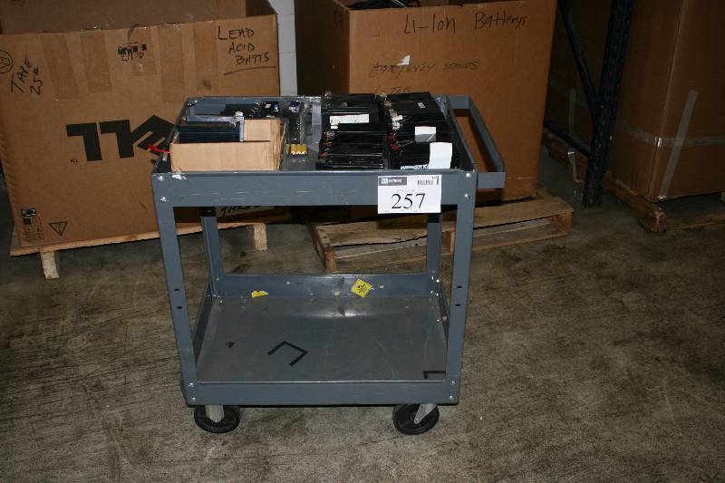 lot 257 image: Plastic Cart wDual Shelves & Wheels Push Handle 31 x 20 x 32 Contents Not Included.