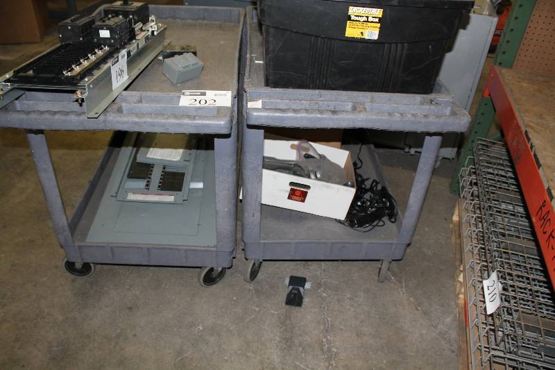 lot 202 image: Lot of (2) Plastic Push Carts wWheels & 2 Shelves 44 x 26 x 35 Contents Not Included.