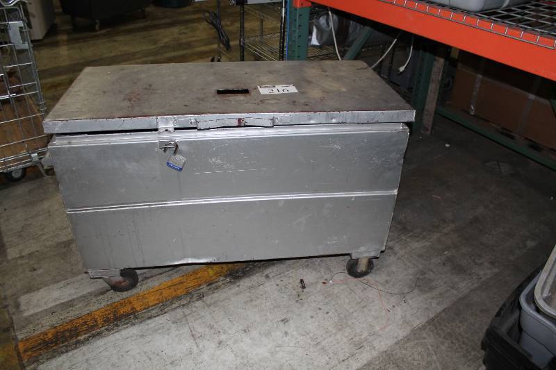 lot 216 image: Metal Organizational Cabinet wWheels & Top Door 51 x 24 x 32.