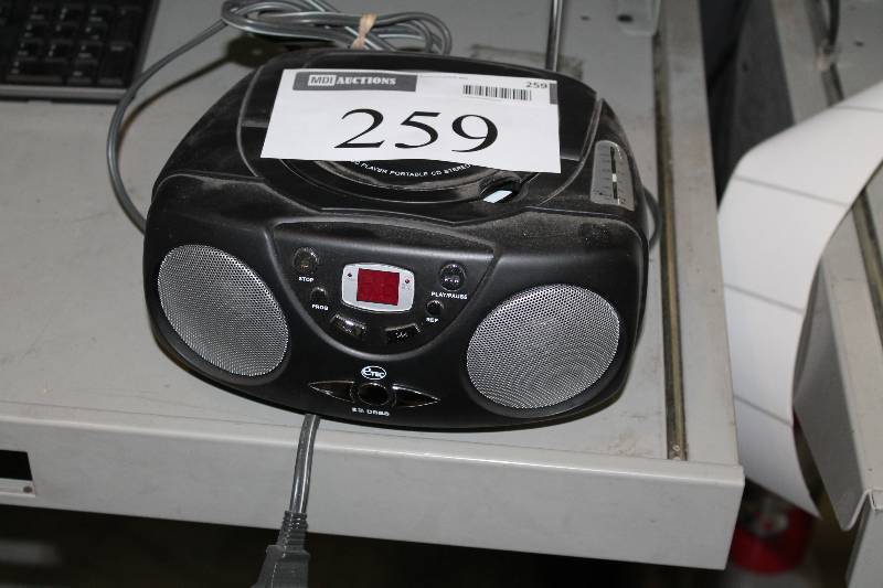 lot 259 image: Portable CD Player with AMFM Radio & Cord.