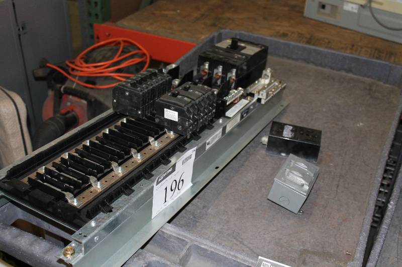 lot 196 image: Contents of Cart Including Circuit Breaker Panel Board And More Does Not Include Cart.