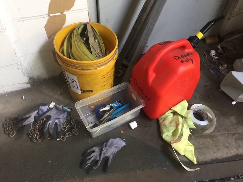 lot 229 image: Bucket lot includes 2 in. Tie down straps, chain, tools and more