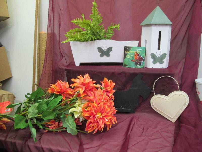 lot 59 image: Butterfly planter, bird house, fake...