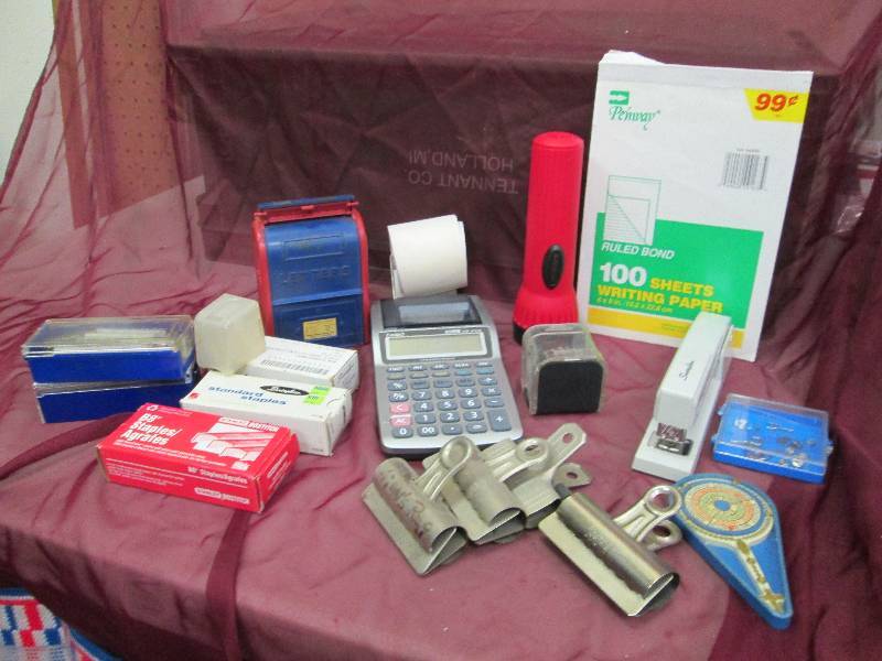 lot 69 image: Casio calculator , Staples, writing...