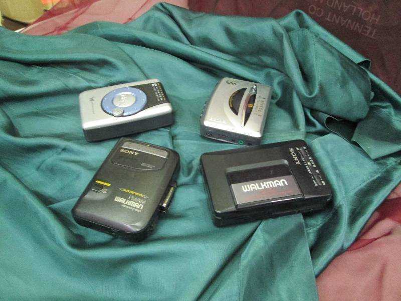 lot 81 image: Qty 4 Walkmans...