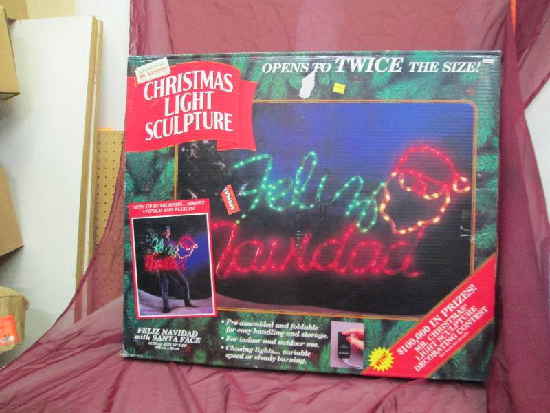 lot 98 image: Christmas light sculpture says Feli...