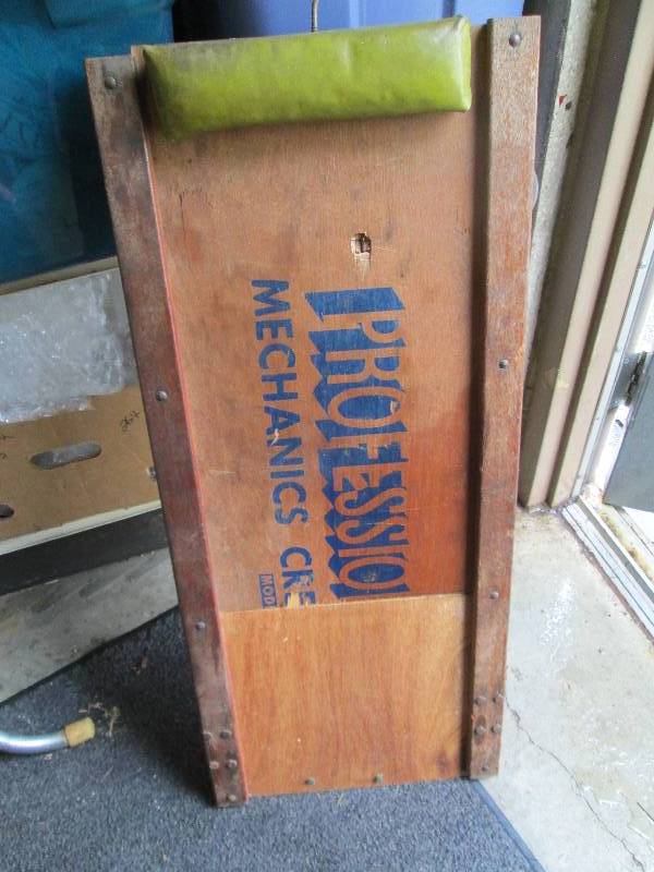 lot 125 image: board you laying and go under cars...