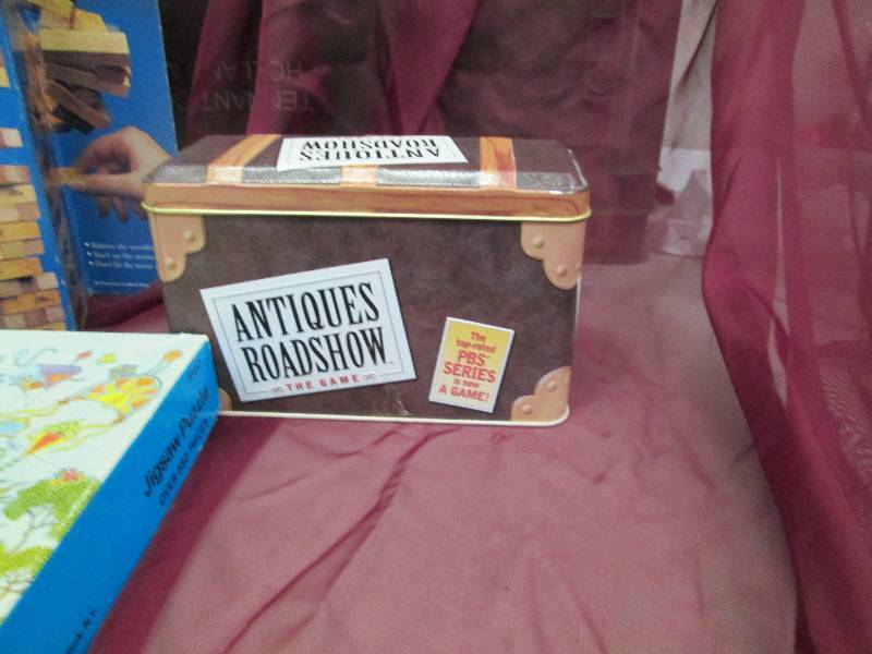 lot 138 image: Jenga, Go fly a kite puzzle and Ant...
