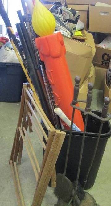 lot 192 image: golf clubs, trashcans,drying rack a...