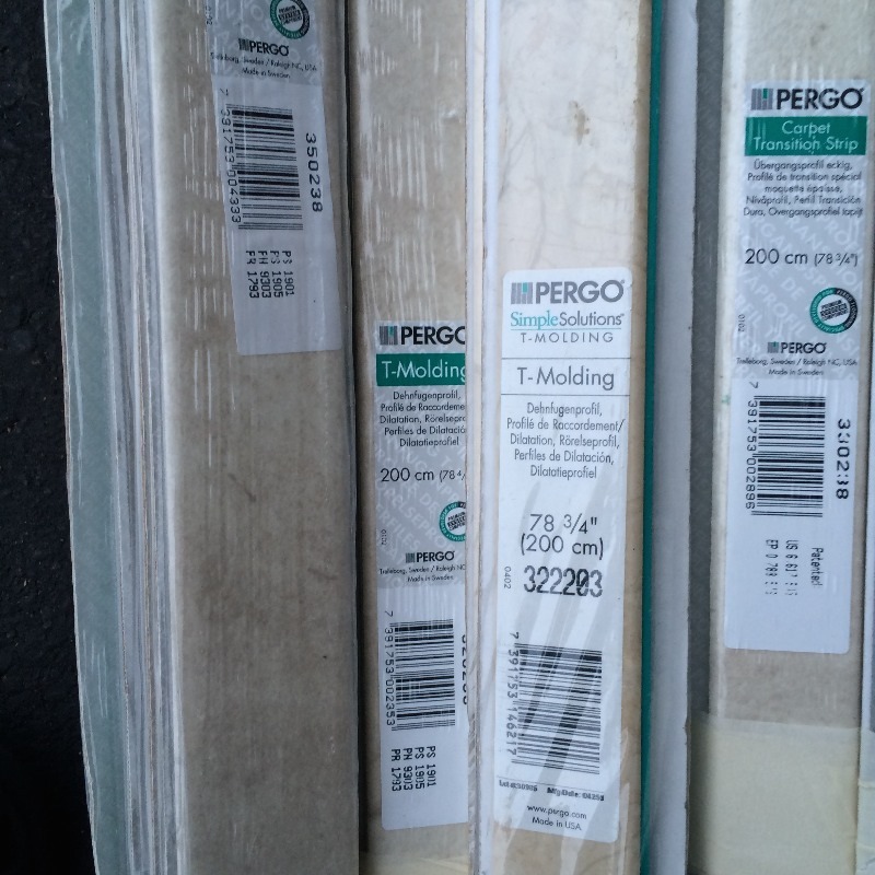 PERGO assorted carpet transition, stair nose,reducer strip, T molding  Lot of approx. 20   8 foot pieces   New