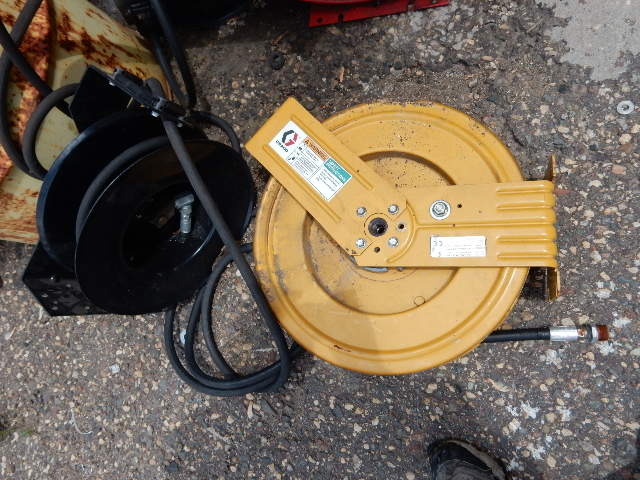 6 Oil Hose Reels.. With hose.