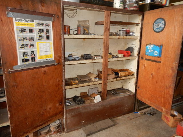 Wood Cabinet as pictured.. Nothing inside.