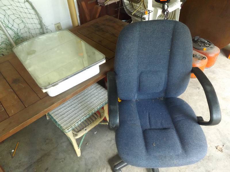 Old Medicine cabinet and blue office chair