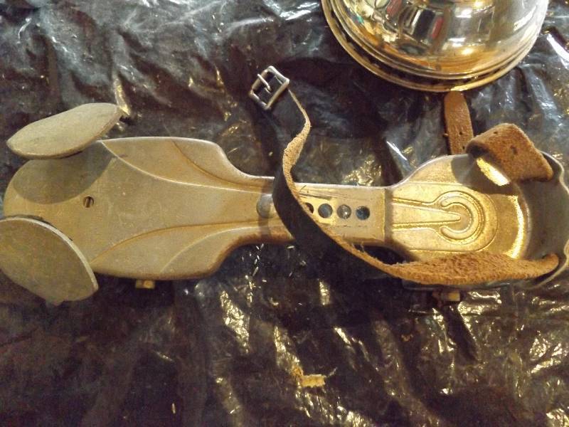lot 103 image: Oil Lamp and Roller Skates