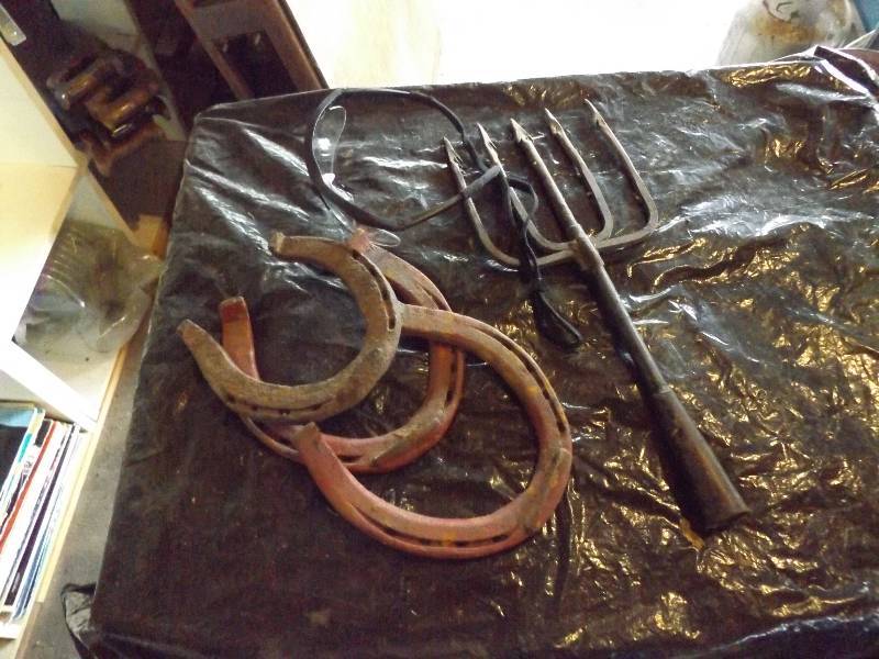 lot 108 image: Horse Shoes, Old License Plates