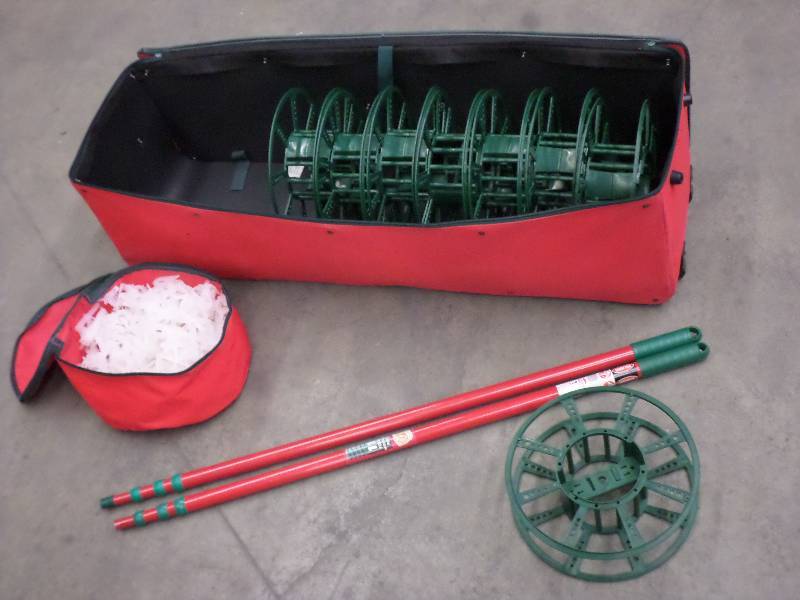 lot 51 image: Case With (2) 11ft Extendable Poles...