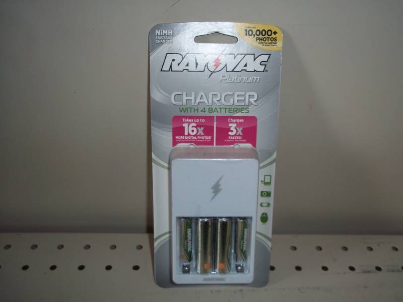 lot 25 image: New Rayovac Charger with 4 Batteries NiMH