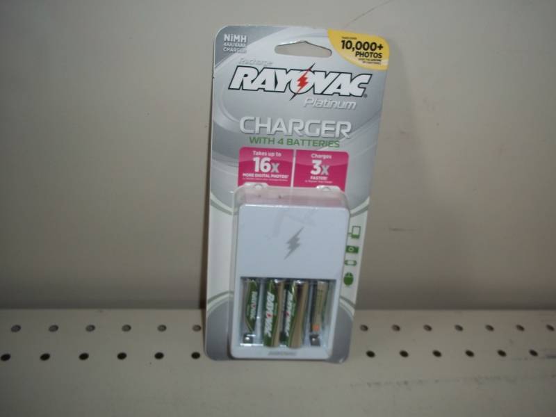 lot 26 image: New Rayovac Charger with 4 Batteries NiMH
