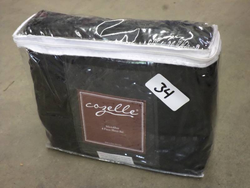 lot 34 image: New Cazelle 4-Piece Micro-Fiber Que...