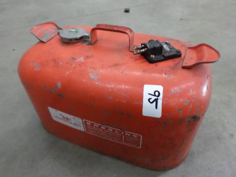 lot 95 image: Johnson 5-Gallon Steel Outboard Mot...