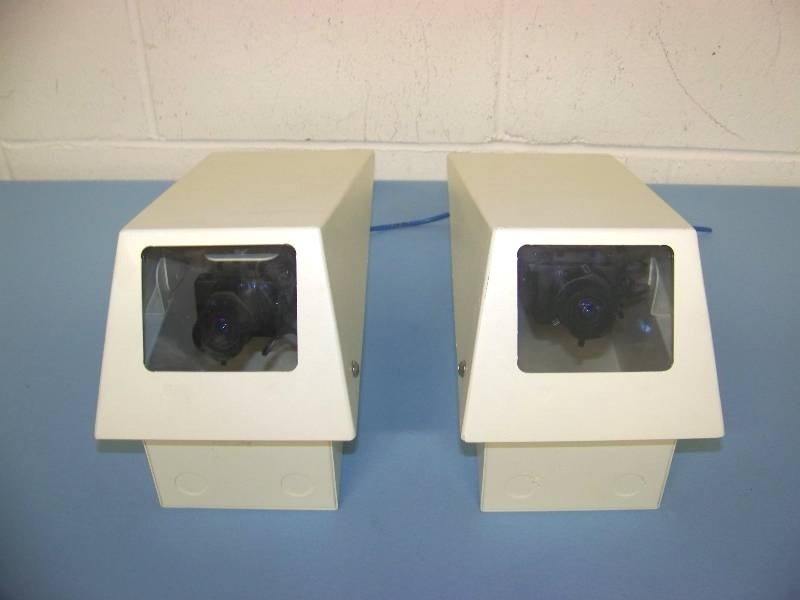 lot 36 image: (2) Checkpoint, Security Cameras in Metal Casings