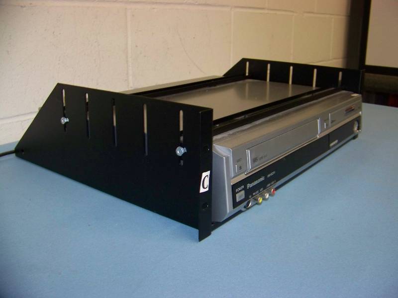 lot 87 image: Panasonic, DVD  VCR Combo  DVD Recorder in Middle Atlantic Rack