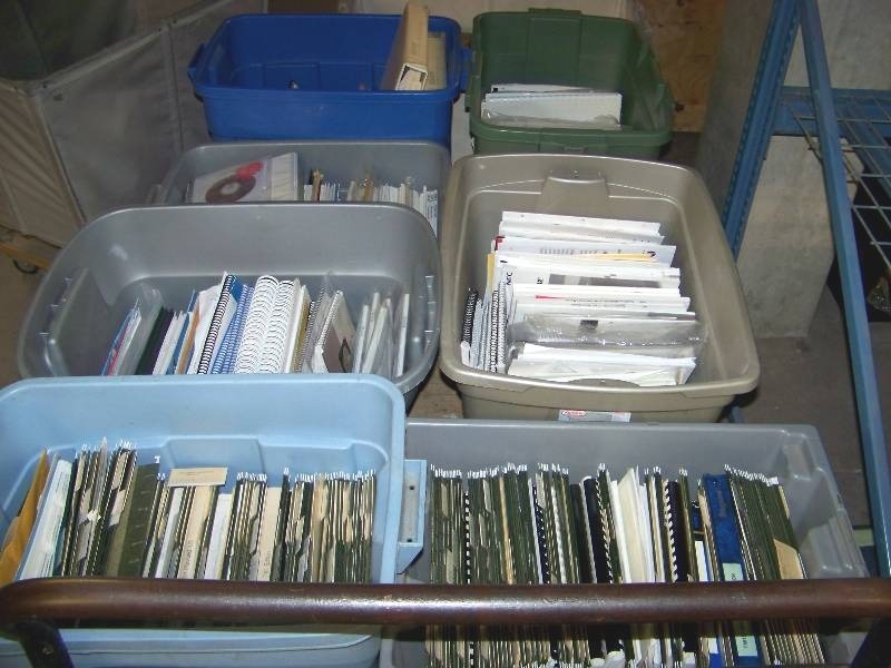 lot 117 image: (7) Plastic Bins filled with Major Manufacturer, Manuals and User Guides