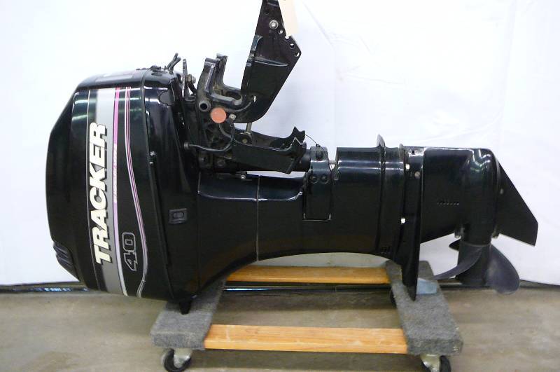 lot 27 image: Outboard motor Tracker by mercury 40 HP Pro Series Tilt and Trim 2003- 40ELPT NEW NEVER USED  2 Stroke Oil Injection