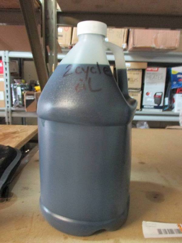 lot 79 image: 1 gallon of bulk 2 cycle oil