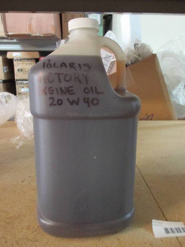 lot 81 image: 1 gallon of bulk Polaris Victory 20W40 oil