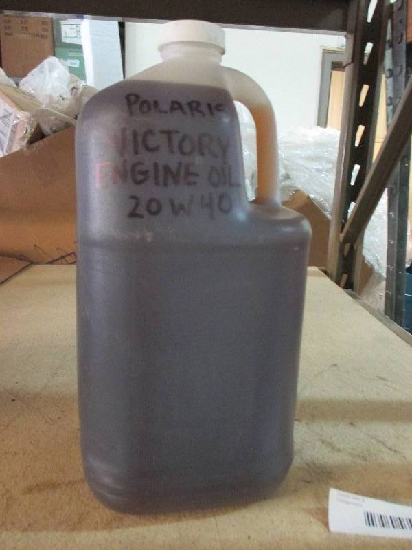 lot 82 image: 1 gallon of bulk Polaris Victory 20W40 oil