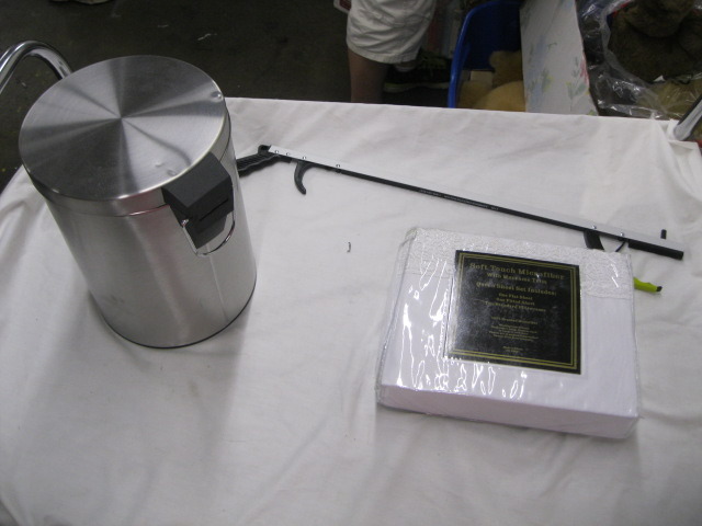 Trash can, bed sheets, grabber