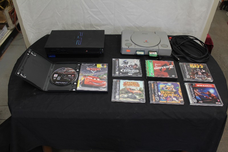 lot 175 image: PS1 and PS2 with games and cords