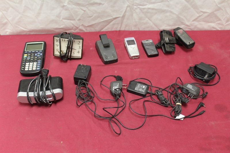 lot 181 image: Vintage Cell Phones, Calculator, Power Cords