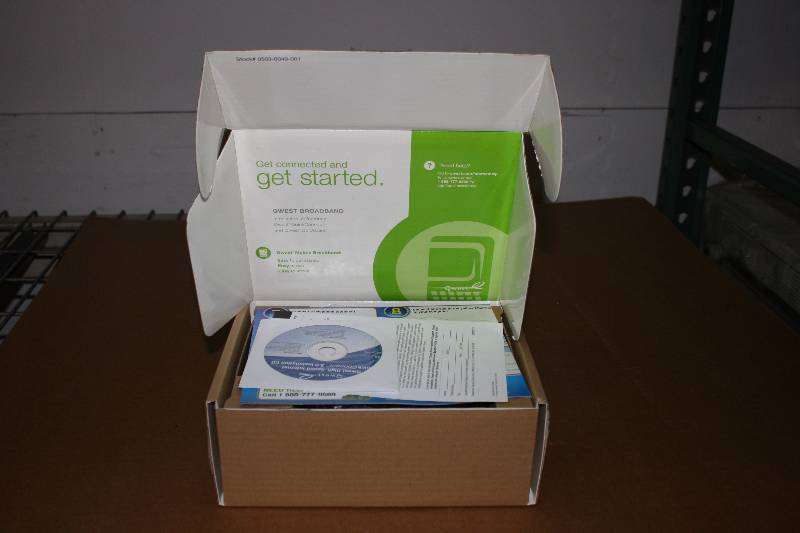 lot 27 image: Quest Actiontec M1000 Modem Includes Cords & Manual.
