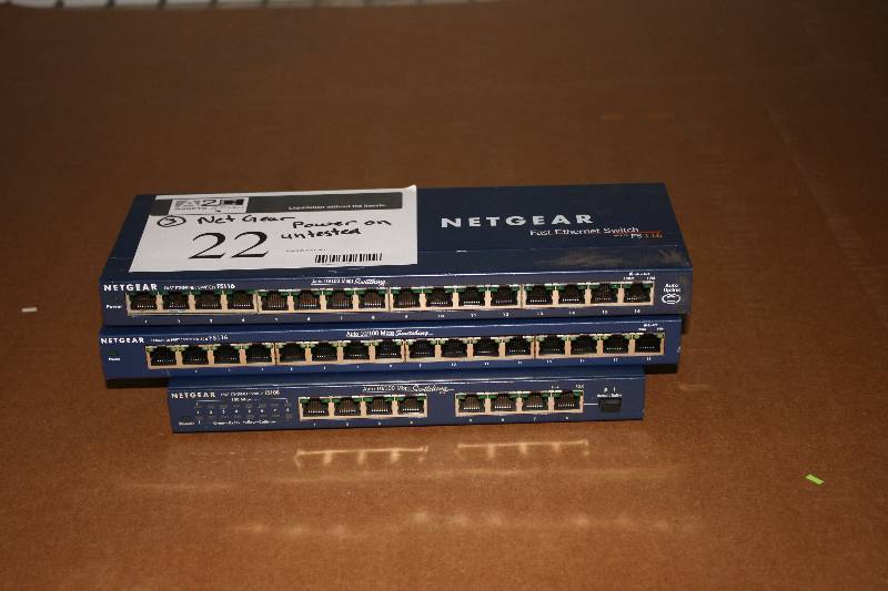 lot 22 image: Lot of (3) Netgear Fast Ethernet Switches Powers On & Untested.