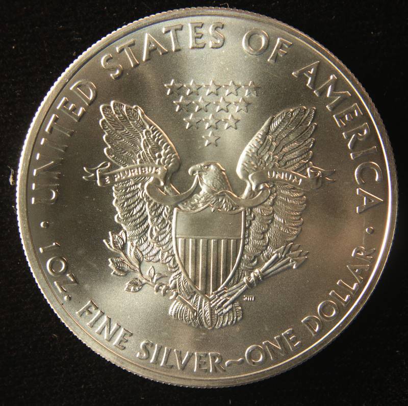 2015 AMERICAN SILVER EAGLE 1 TROY OZ. .999 FINE SILVER DOLLAR COIN IN AIRTIGHT CAPSULE