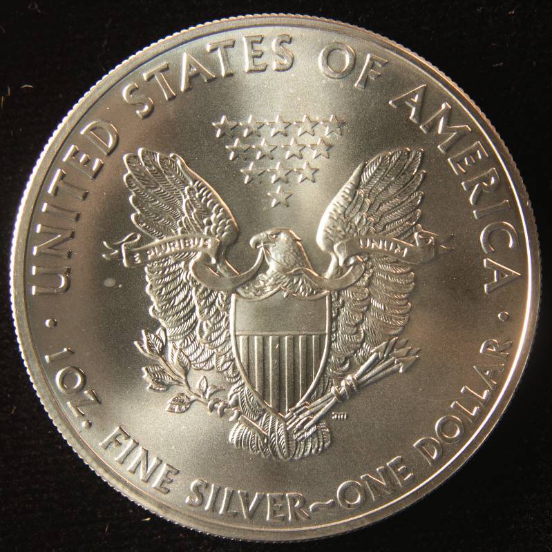2015 AMERICAN SILVER EAGLE 1 TROY OZ. .999 FINE SILVER DOLLAR COIN IN AIRTIGHT CAPSULE